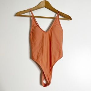 Matte collection peach cheeky one piece swimsuit